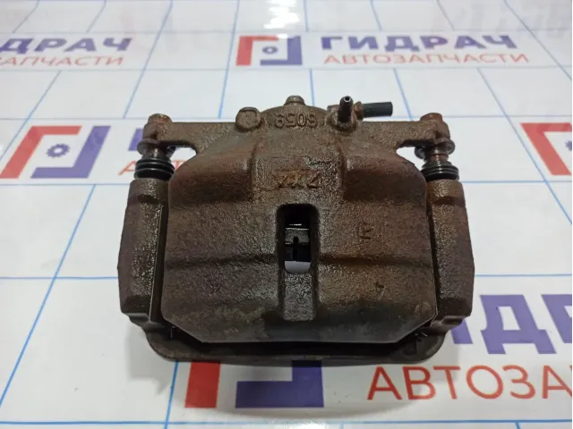 Суппорт тормозной передний левый Nissan Qashqai (J10) 41011-JD00A.