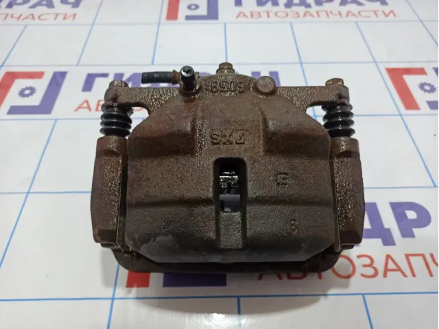 Суппорт тормозной передний правый Nissan Qashqai (J10) 41001-JD00A.