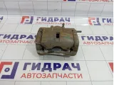 Суппорт тормозной передний левый Nissan Qashqai (J10) 41011-JD00A
