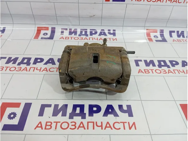Суппорт тормозной передний левый Nissan Qashqai (J10) 41011-JD00A