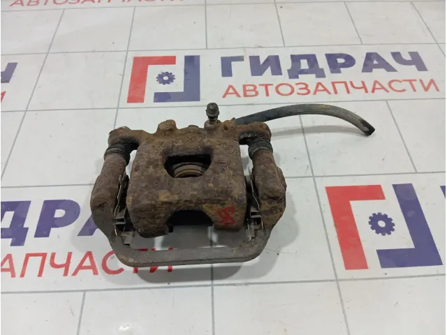 Суппорт тормозной задний правый Nissan Qashqai 44001EM11A