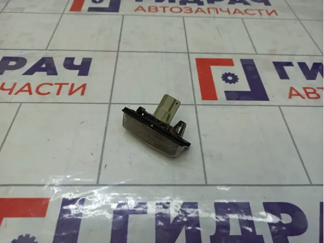 Фонарь подсветки номера Nissan Teana 265109Y00A