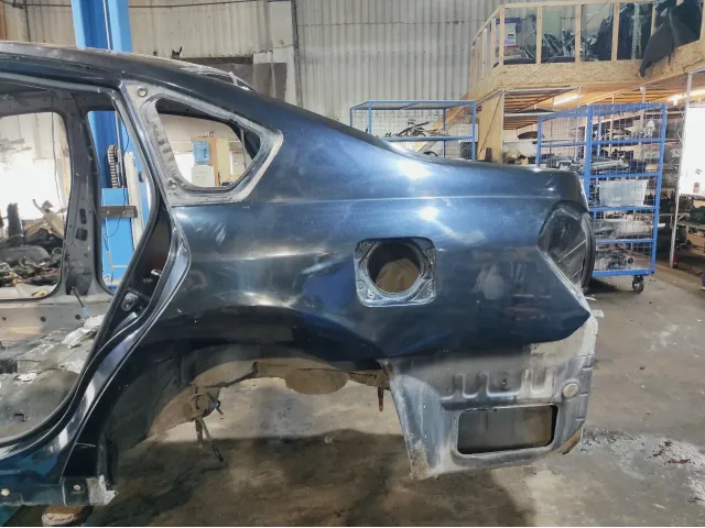 Крыло заднее левое Nissan Teana (J31)