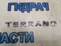 Эмблема на крышку багажника Nissan Terrano III Nissan Отличное состояние.