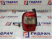 Фонарь задний наружный левый Nissan Terrano 265559765R