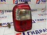 Фонарь задний наружный левый Nissan Terrano 265559765R