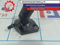 Крышка термостата Nissan Tiida 13049-ED02A.