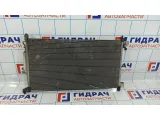 Радиатор кондиционера Nissan Tiida 92100-EL00A.