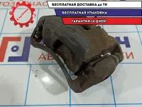 Суппорт тормозной передний правый Nissan Tiida 41001-EM10A.