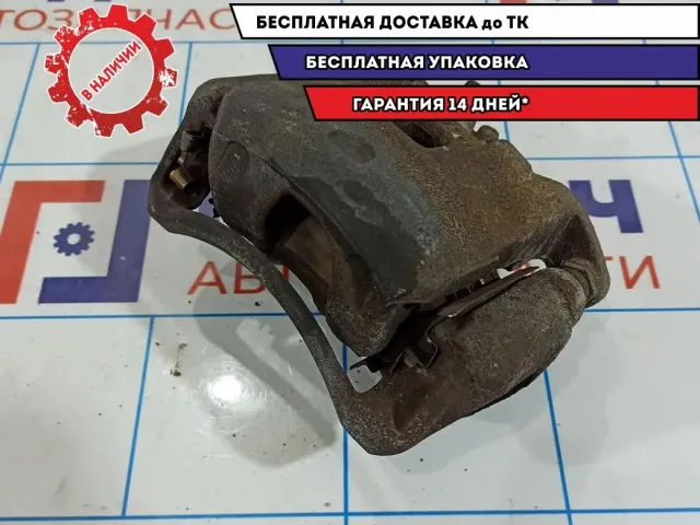 Суппорт тормозной передний правый Nissan Tiida 41001-EM10A.