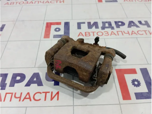Суппорт тормозной задний правый Nissan Tiida 44001EM11A
