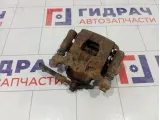 Суппорт тормозной задний правый Nissan Tiida 44001EM11A