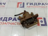 Суппорт тормозной задний правый Nissan Tiida 44001EM11A