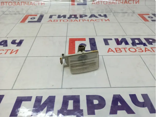 Фонарь подсветки номера Nissan Tiida 26510CD00A