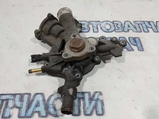 Насос водяной (помпа)  Opel Corsa D 1334145