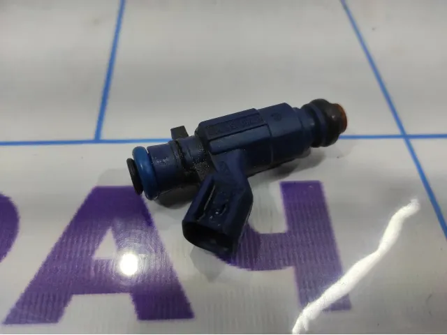 Форсунка инжекторная электрическая Opel Antara (C105) 92068193.