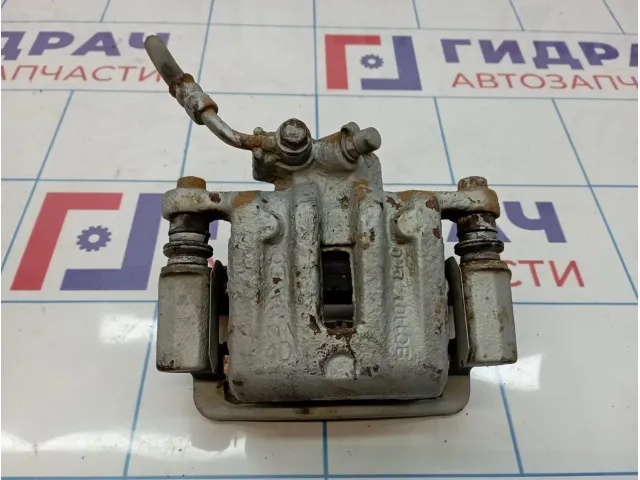 Суппорт тормозной задний левый Opel Antara (С145) 95520191