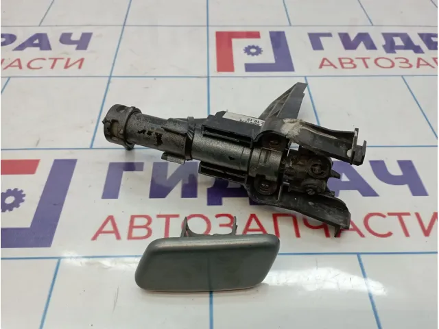 Форсунка омывателя фары левая Opel Antara (С145) 20784320