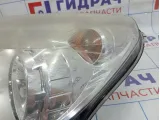 Фара левая Opel Astra (H) 1216659