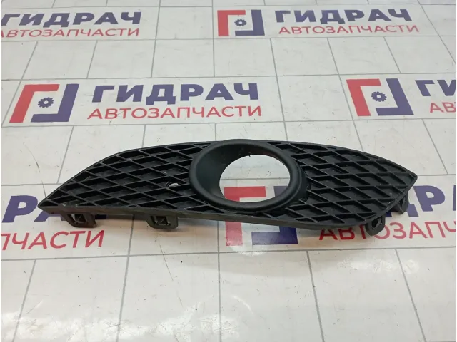Рамка противотуманой фары левая Opel Astra H