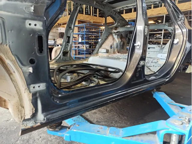 Порог со стойкой левый Opel Astra (J)