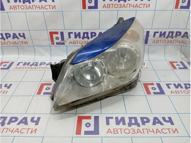Фара левая Opel Astra (H) 1216659