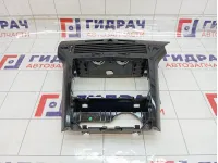 Рамка магнитолы Opel Astra 7209566