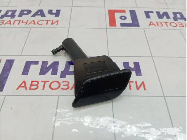 Форсунка омывателя фары левая Opel Astra 1452117