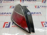Фонарь задний левый Opel Astra 1222355