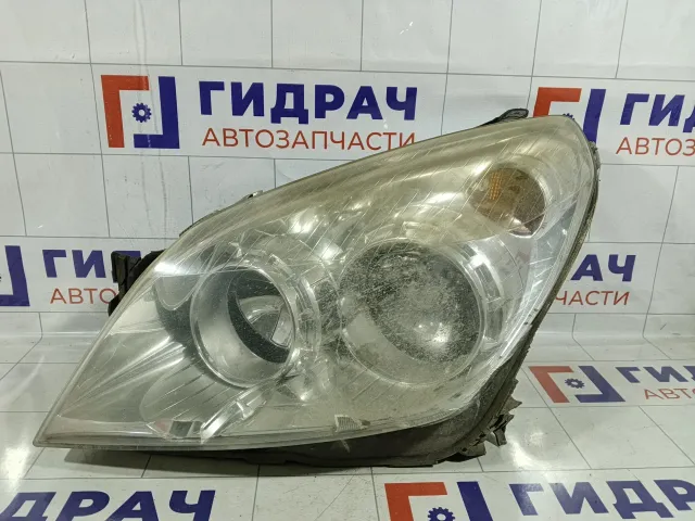 Фара левая Opel Astra 13239286