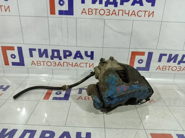 Суппорт тормозной передний правый Opel Astra 542472