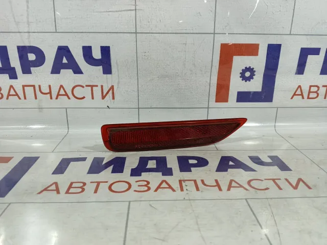 Отражатель задний левый Opel Astra 13158074