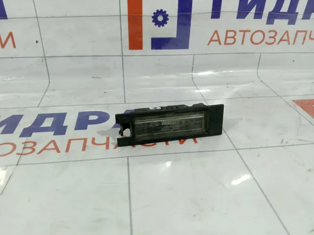 Фонарь подсветки номера Opel Astra 13251936