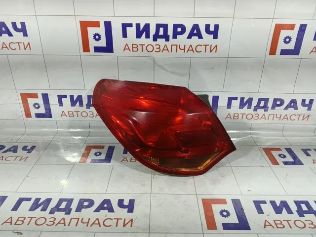 Фонарь задний наружный левый Opel Astra 1222087