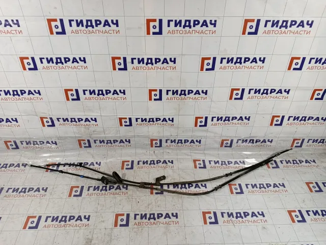 Трос ручника (Трос стояночного тормоза) Opel Astra