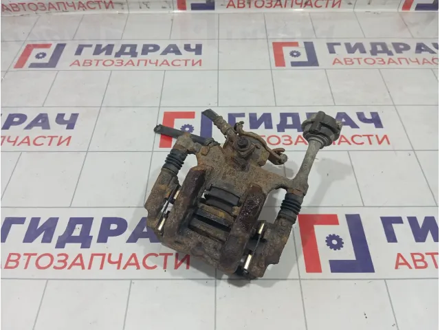 Суппорт тормозной задний левый Opel Astra 542108