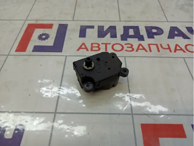 Моторчик заслонки отопителя (печки) Opel Astra