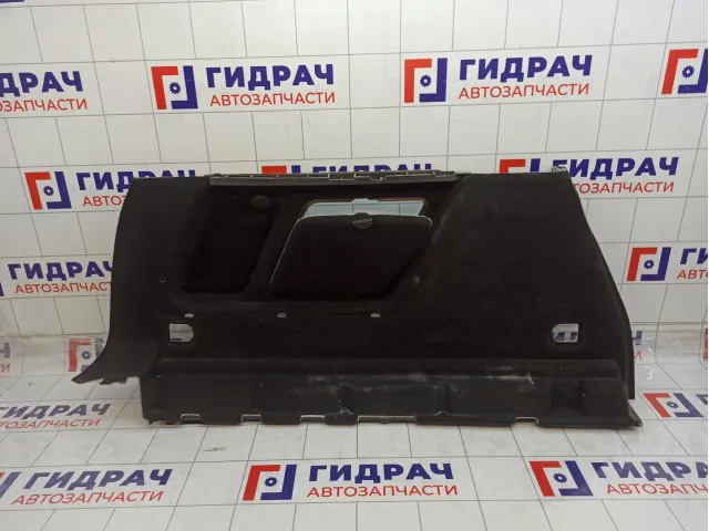 Обшивка багажника левая Opel Astra 13337791