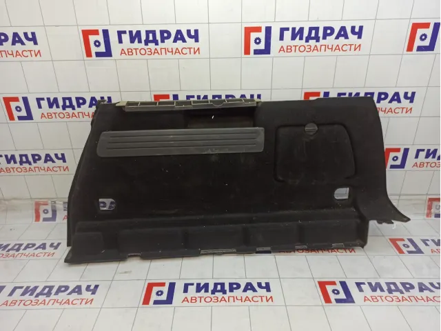 Обшивка багажника правая Opel Astra 13337792