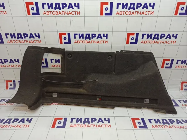 Обшивка багажника левая Opel Astra H 7336141