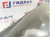 Фара левая Opel Astra (H) 1216565