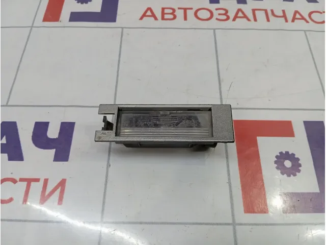 Фонарь подсветки номера Opel Astra (H) 13251936