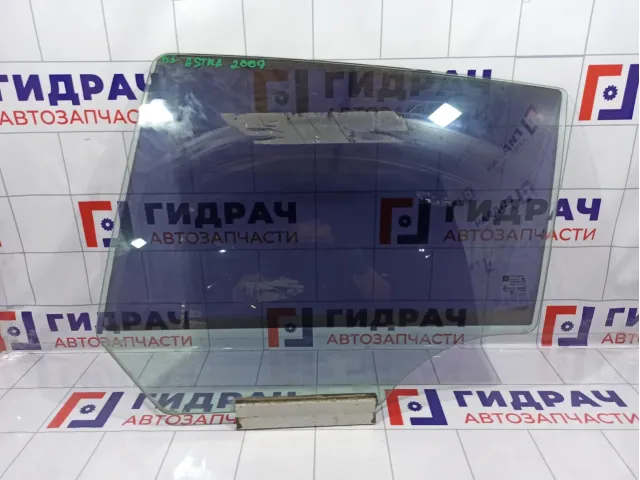 Стекло двери задней левой Opel Astra (H) 5161461