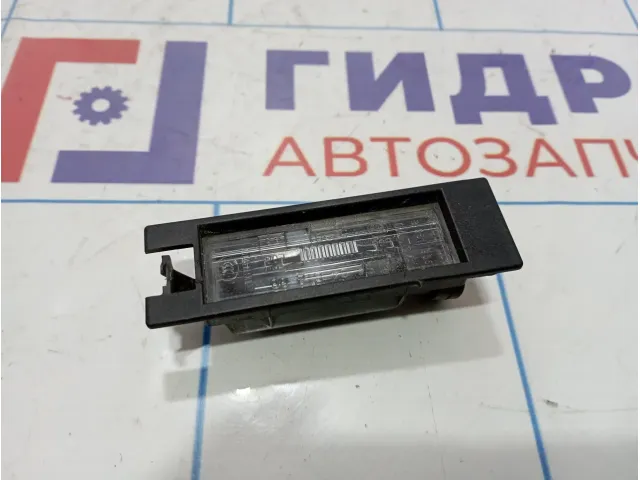 Фонарь подсветки номера Opel Astra (H) 13251936