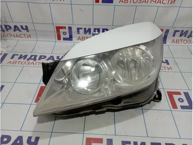 Фара левая Opel Astra (H) 1216659