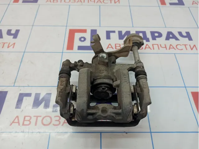 Суппорт тормозной задний левый Opel Astra (J) 13300883.