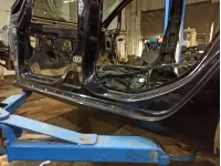 Порог со стойкой левый Opel Astra (J) . Вмятина.