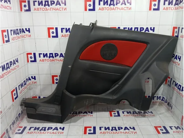 Обшивка багажника правая Opel Corsa 7332173