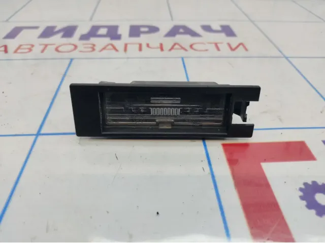 Фонарь подсветки номера Opel Corsa D 13251936