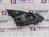 Фара левая Opel Corsa D 1216189